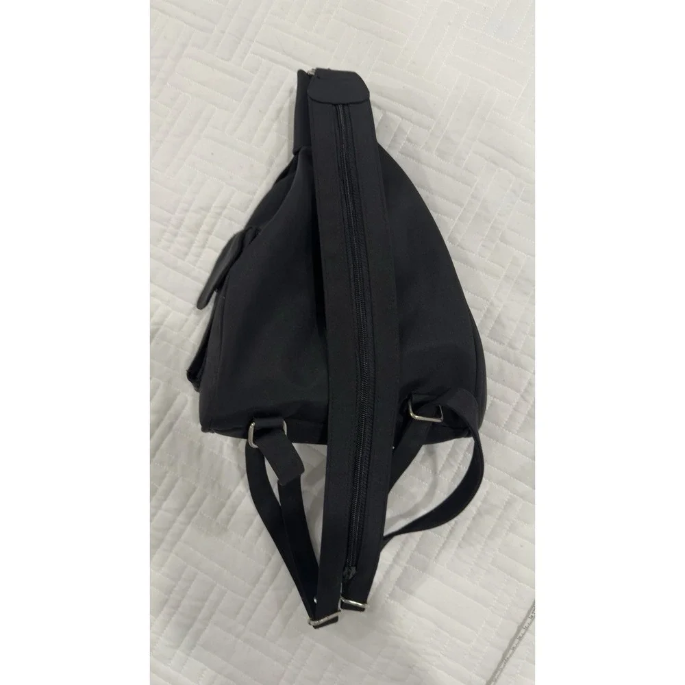 DKNY Donna Karan black‎ nylon sling crossbody backpack bag